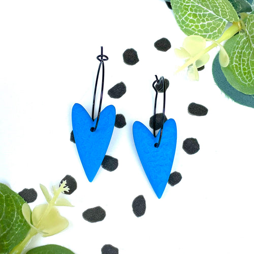 Blue heart hoop earrings on black colour hoops