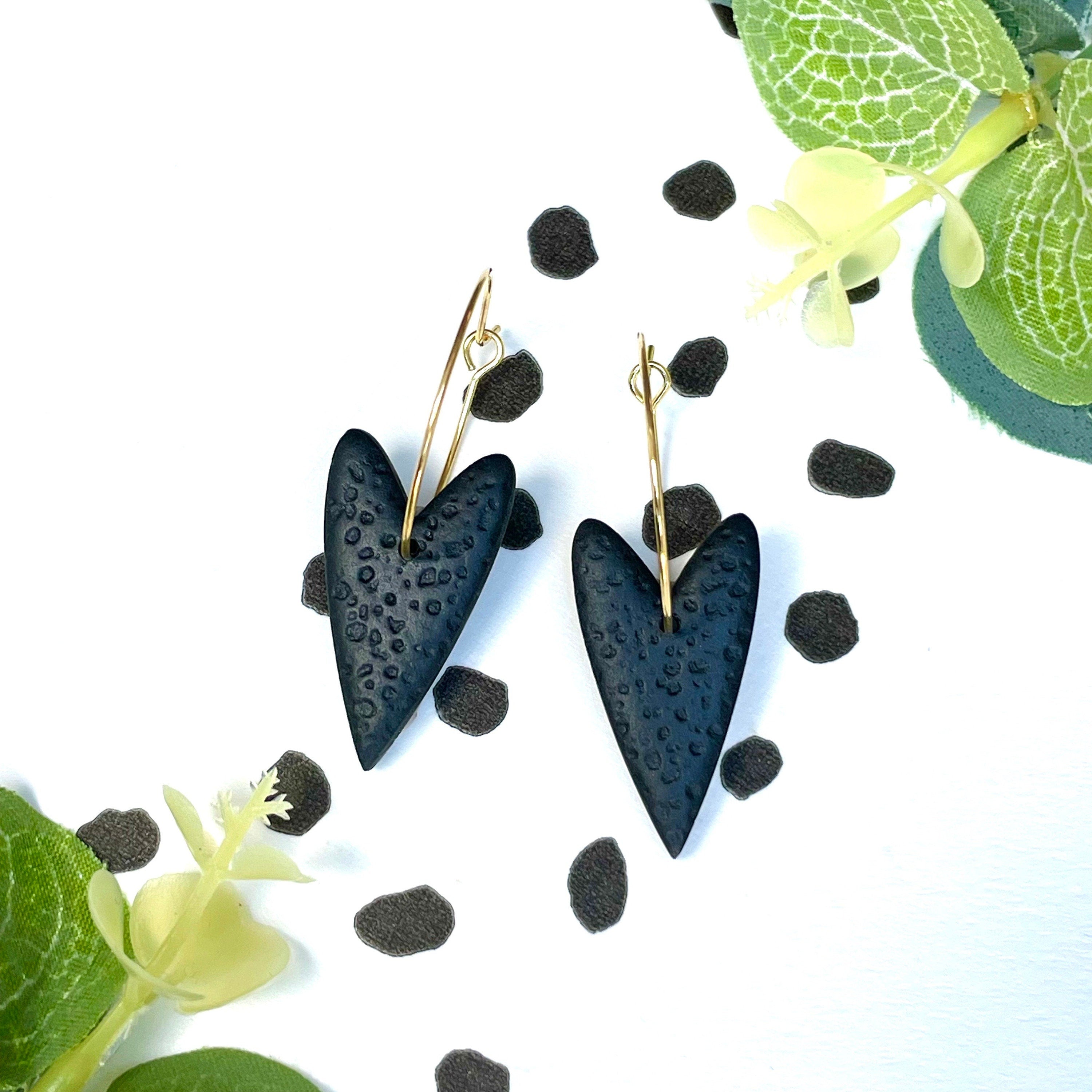 Black heart earrings on gold colour hoops