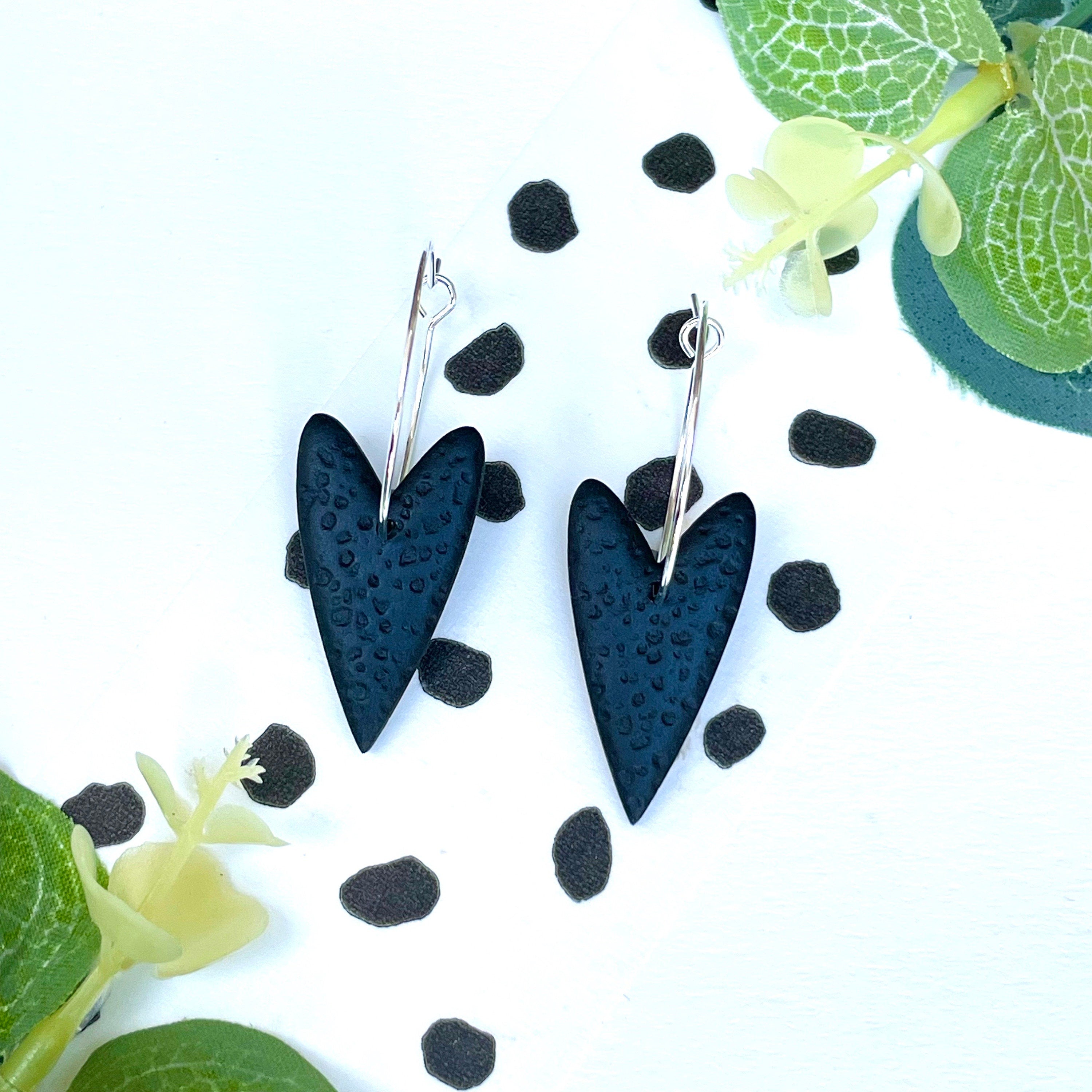Black heart earrings on silver colour hoops