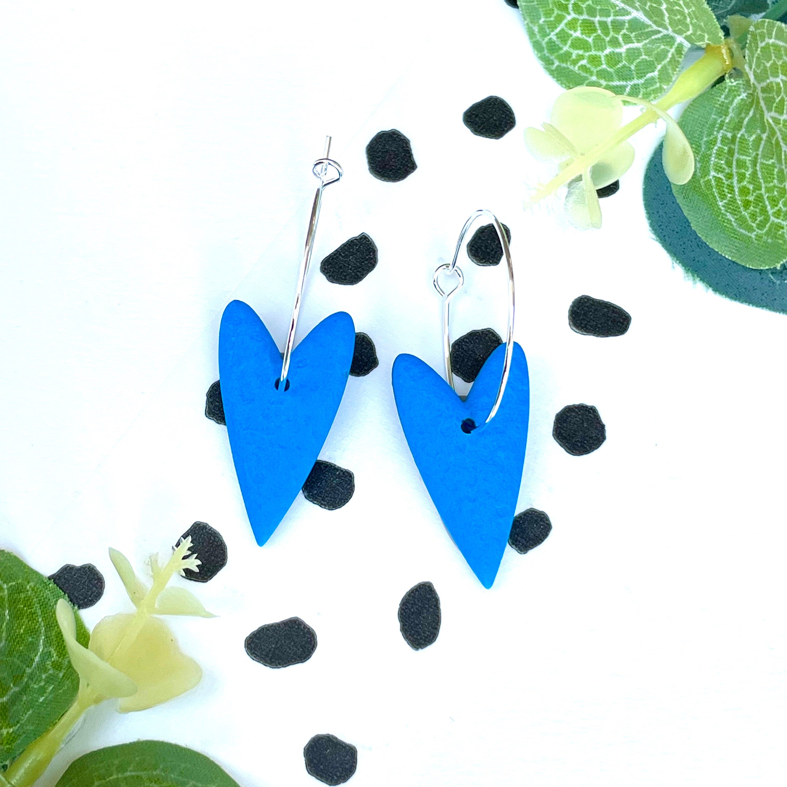 Blue heart hoop earrings on silver colour hoops