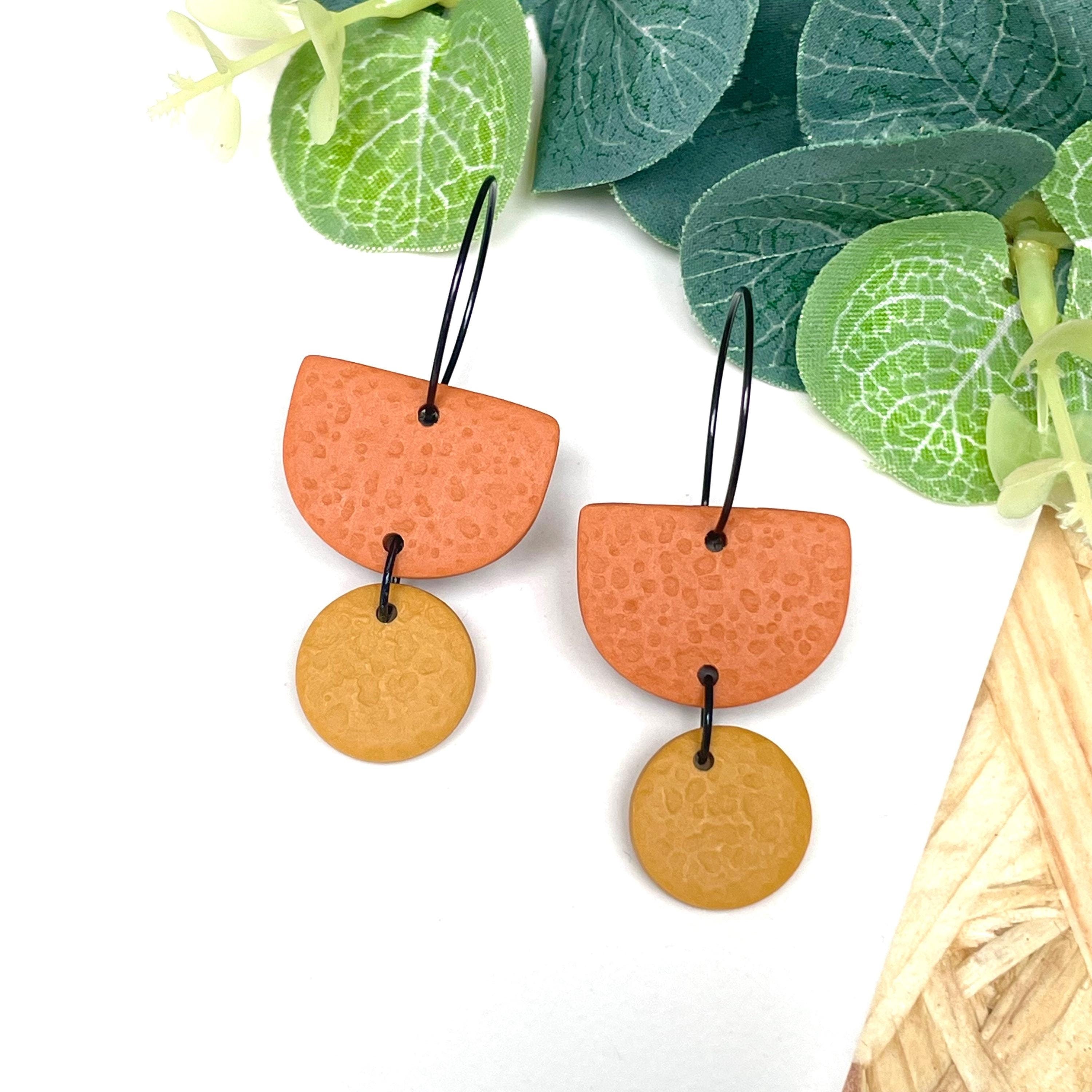 Burnt Orange & mustard yellow hoop earrings with black hoops 