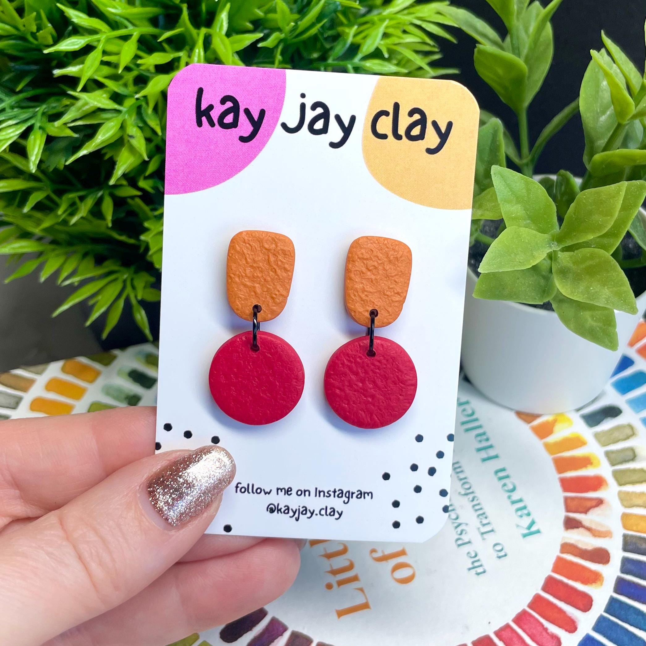 Colour block dangle earrings - burnt orange & red on mounting card