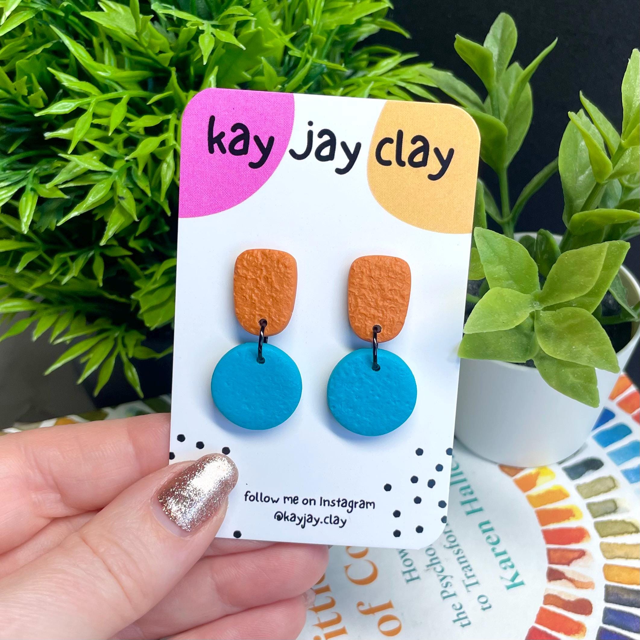 Colour block dangle earrings - burnt orange & turquoise on mounting card