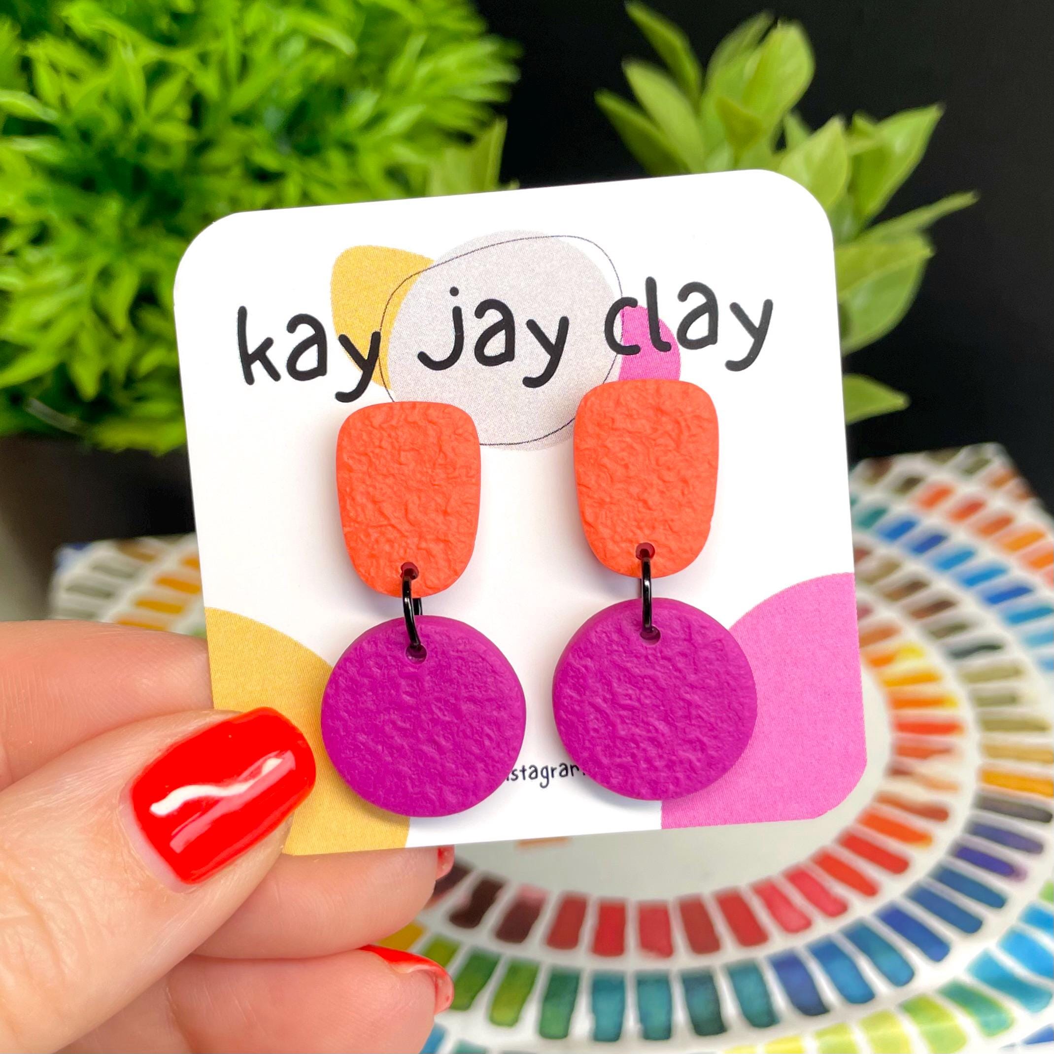 Colour block dangle earrings - coral & hot pink on mounting card