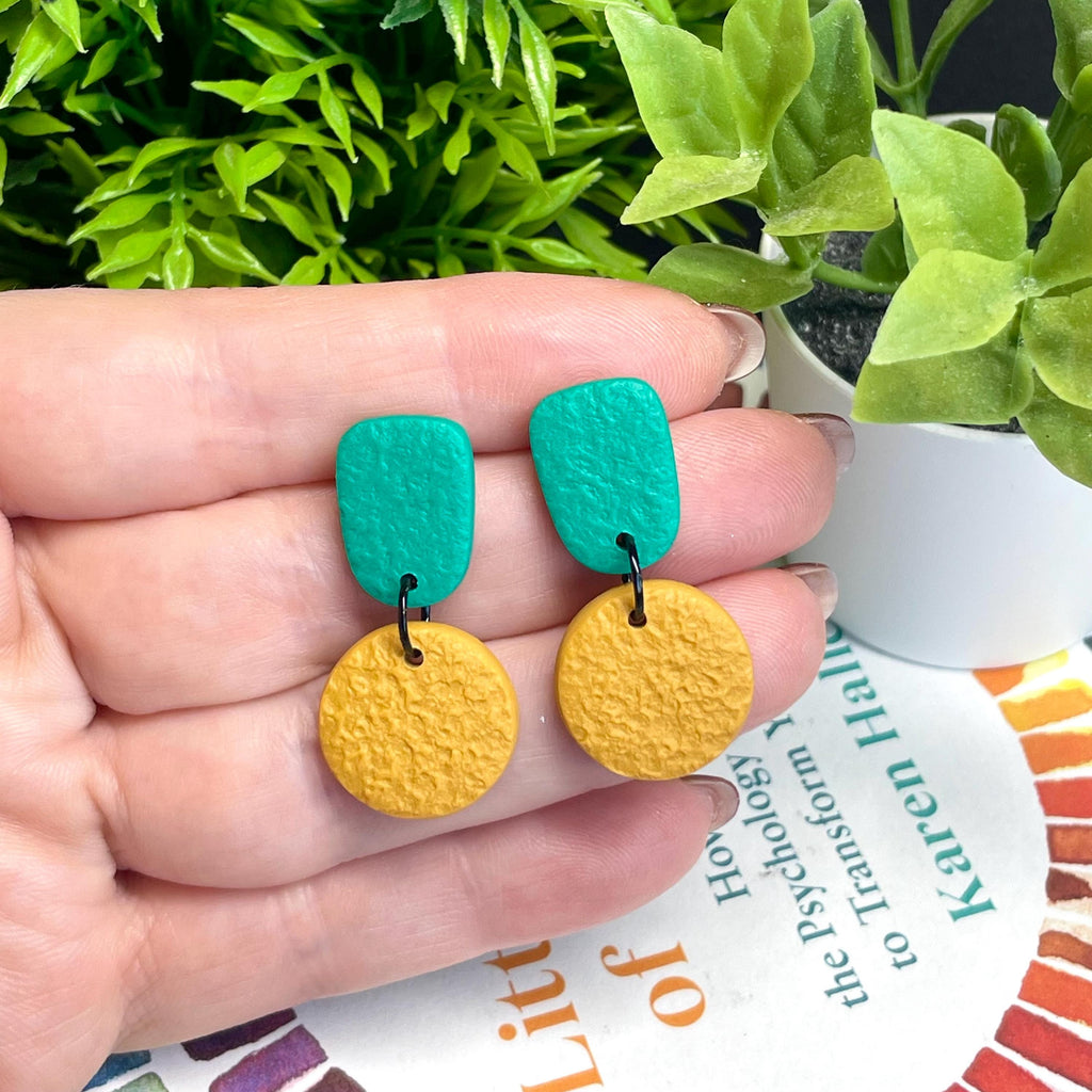 Colour block dangle earrings - emerald green & mustard yellow hand held