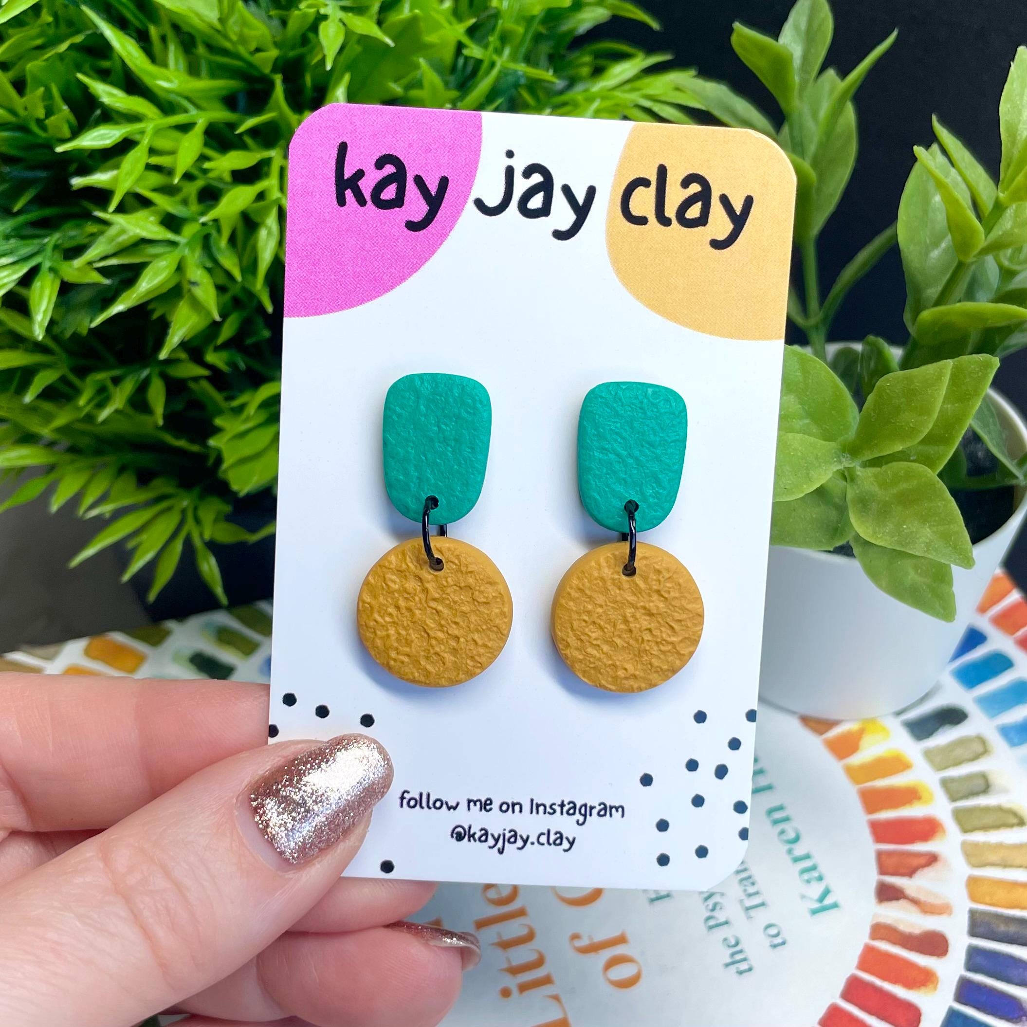 Colour block dangle earrings - emerald green & mustard yellow on mounting card