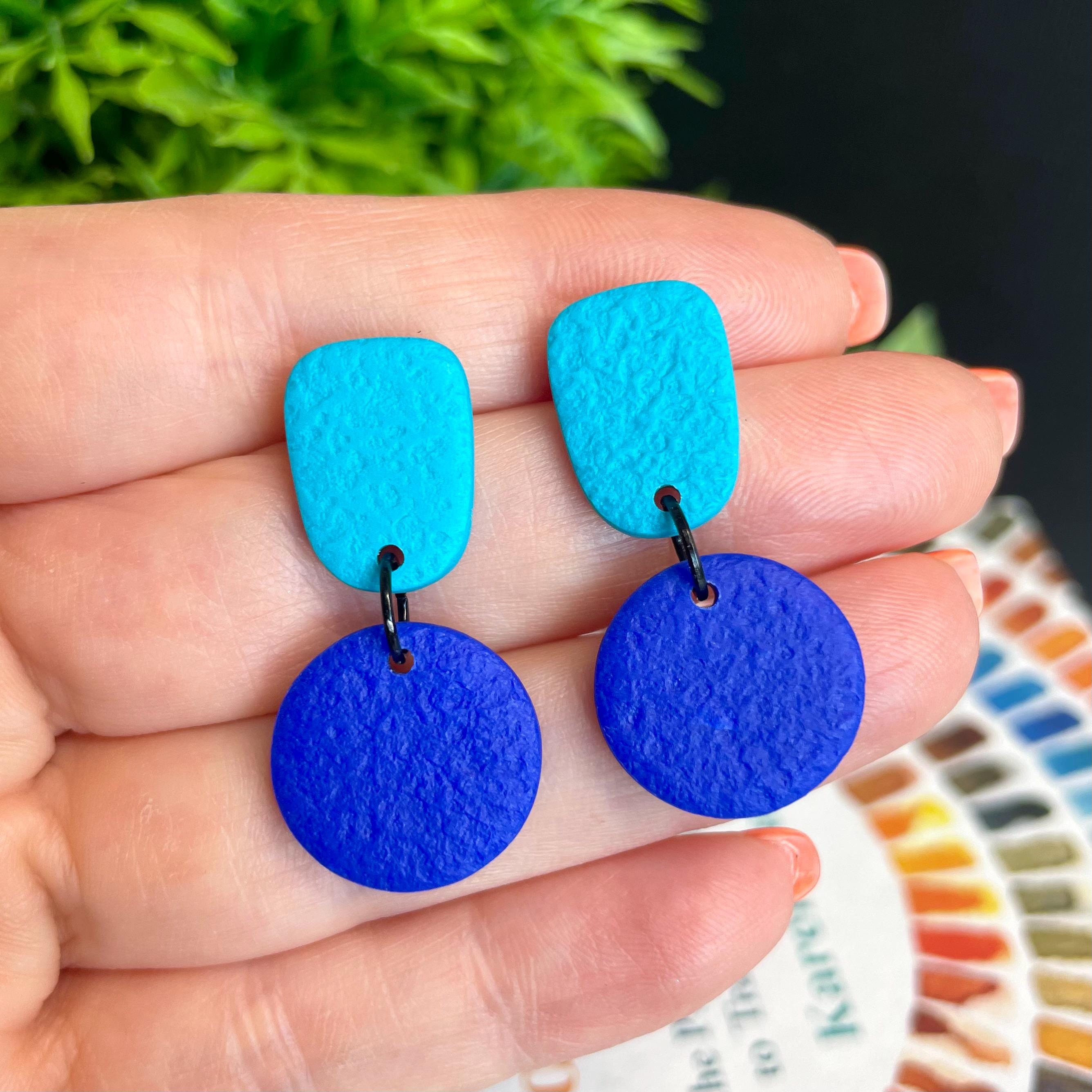 Colour block dangle earrings - turquoise & electric blue hand held