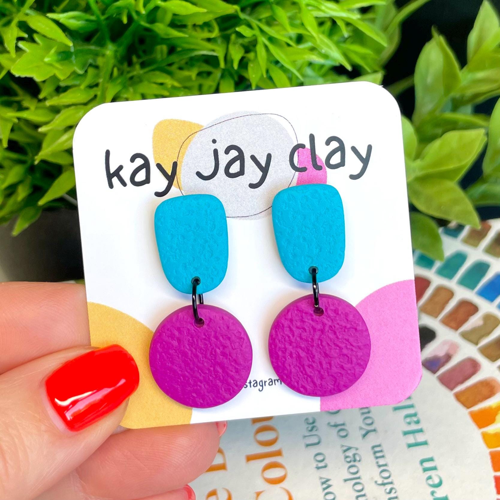 Colour block dangle earrings - turquoise & hot pink on mounting card