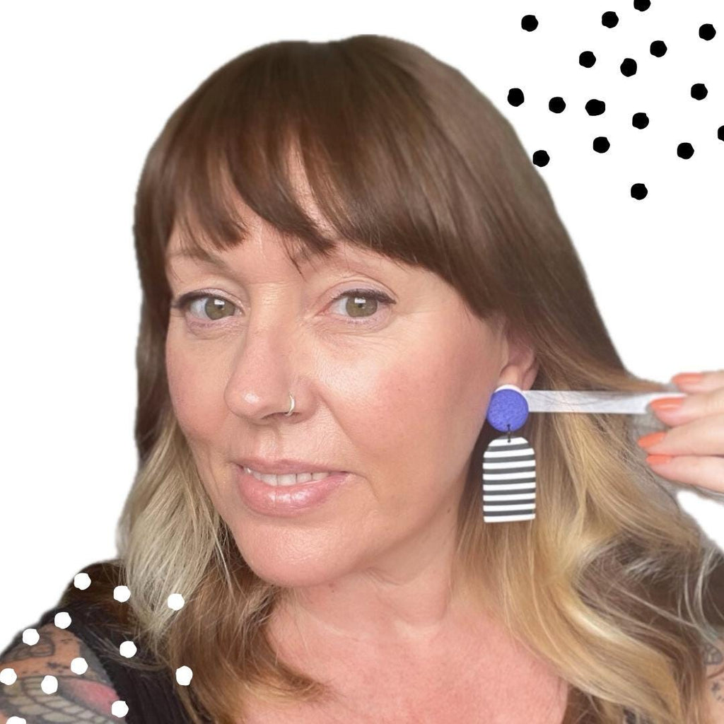 try on picture of Kerry from Kay Jay Clay wearing the Electric blue & monochrome stripe dangle earrings for size reference