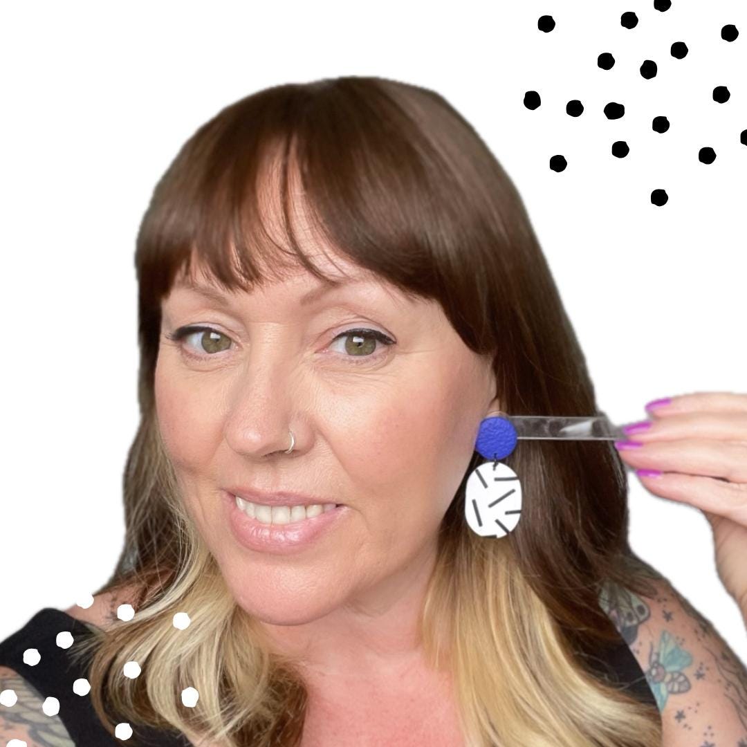 Try on picture of Kerry from Kay Jay Clay wearing the Electric blue top with mono sprinkle oval earrings for size reference