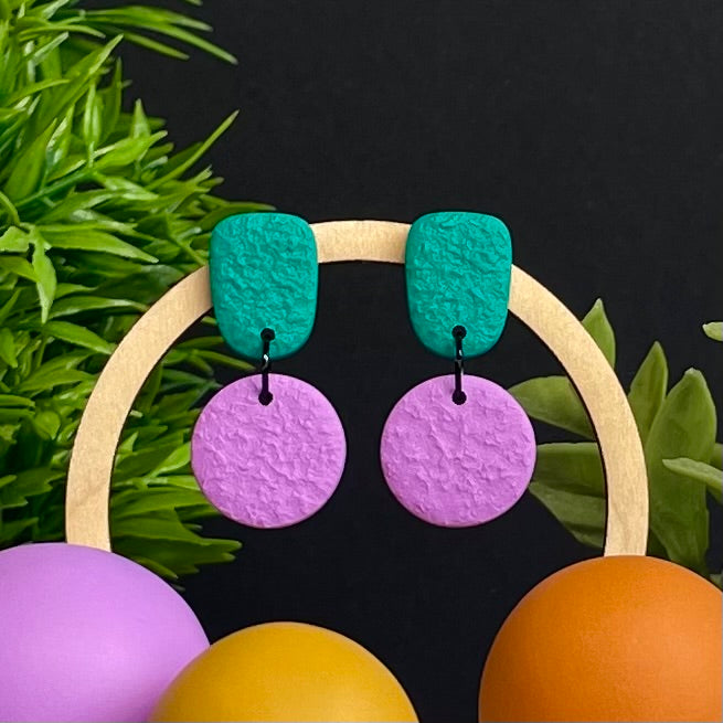 Emerald Green & Lilac colour pop dangle earrings on hoop display prop