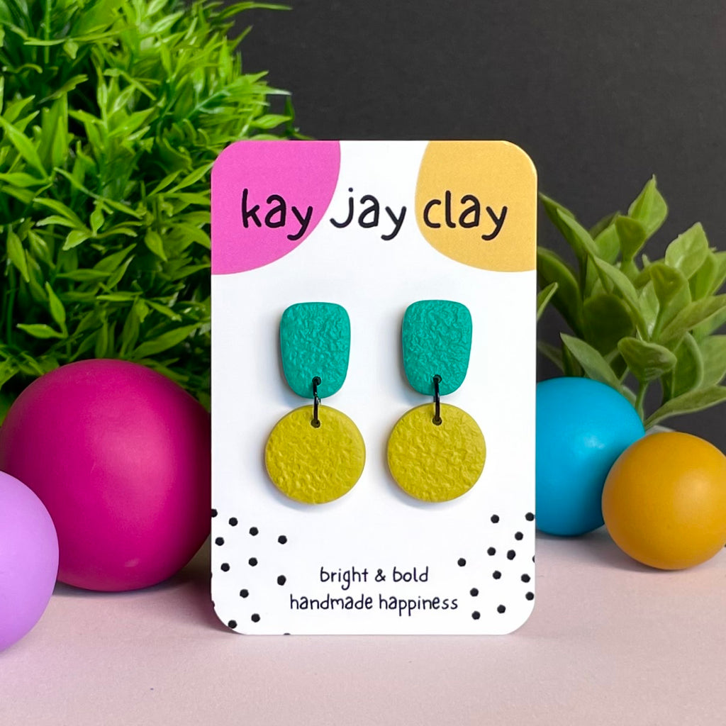 Emerald & Pistachio Green colour pop dangle earrings on Kay Jay Clay branded mounting card