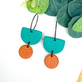 Emerald green & orange hoop earrings with black hoops