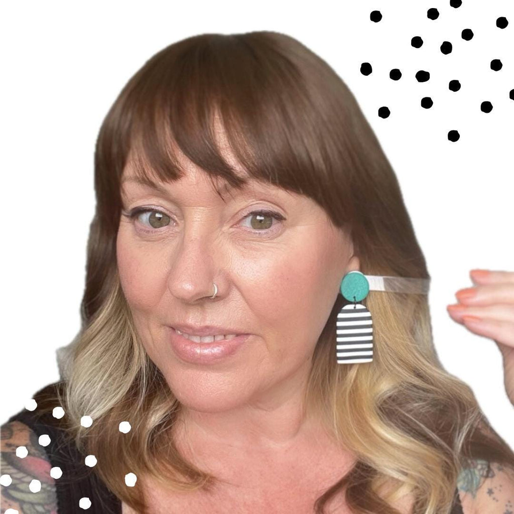 Try on picture of Kerry from Kay Jay Clay wearing the Green mono stripe dangle earrings for size reference