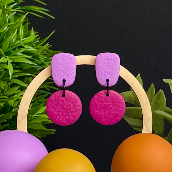 Lilac & Hot Pink colour pop dangle earrings on hoop display prop