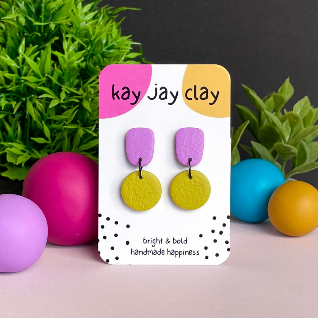 Lilac & Pistachio Green colour pop dangle earrings on Kay Jay Clay branded mounting card