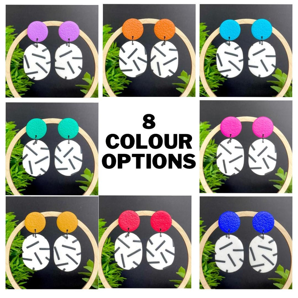 All 8 colours options of the white with black sprinkles oval dangles earring design