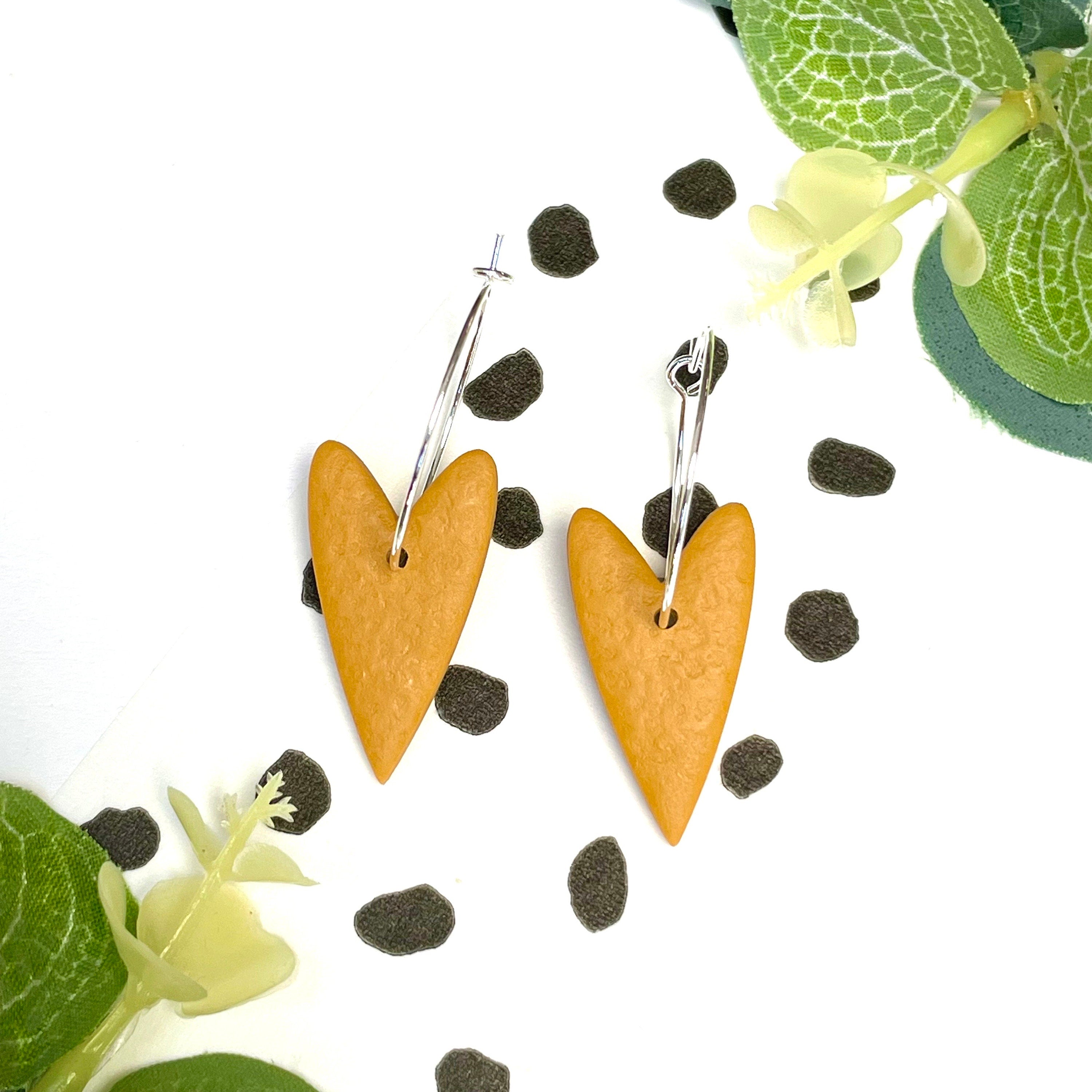 Mustard yellow heart earrings on silver colour hypoallergenic hoops