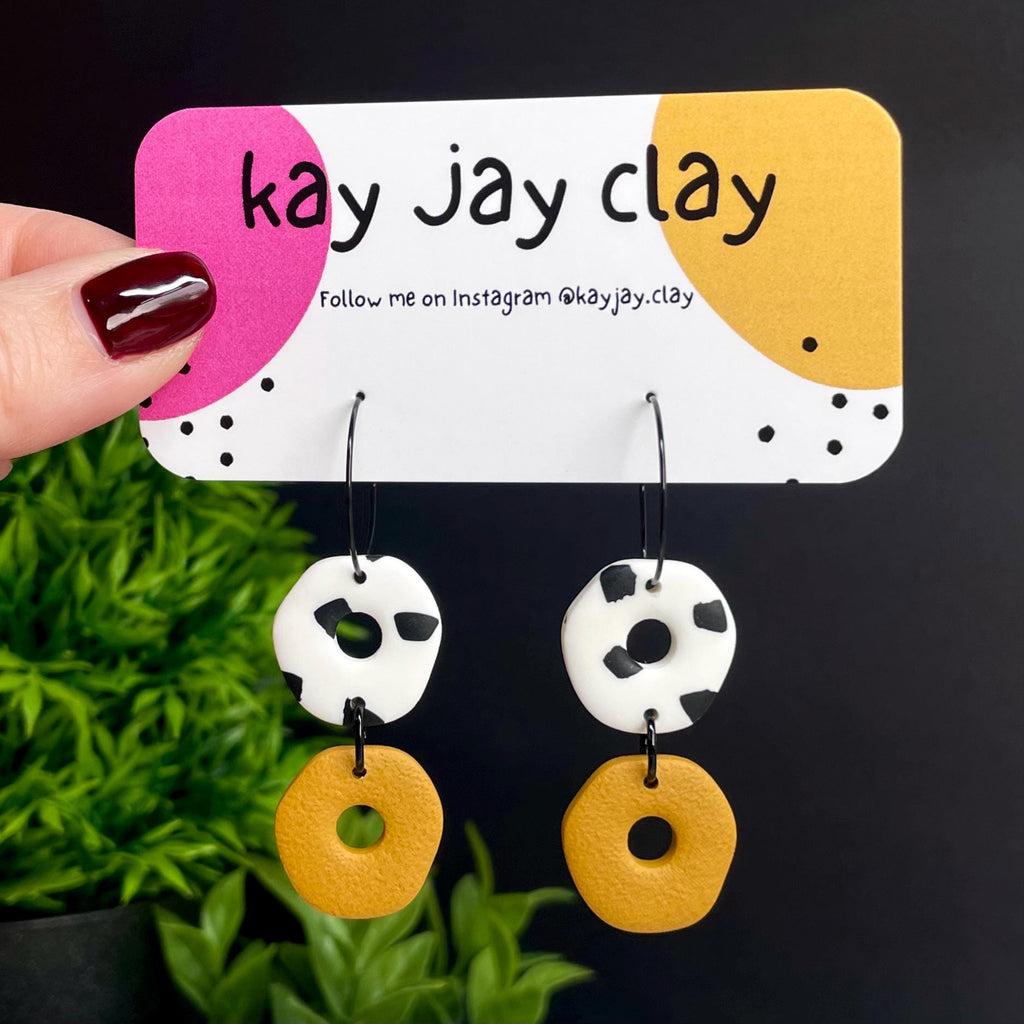Mustard Yellow & Dalmatian print hoop earrings on mounting card