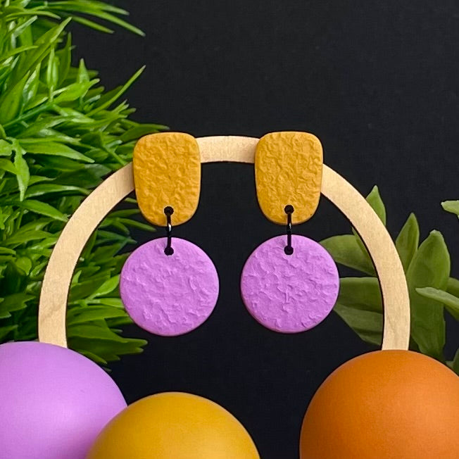 Mustard Yellow & Lilac colour pop dangle earrings on hoop display prop