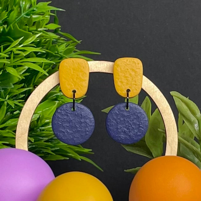 Mustard Yellow & Navy Blue colour pop dangle earrings on hoop display prop