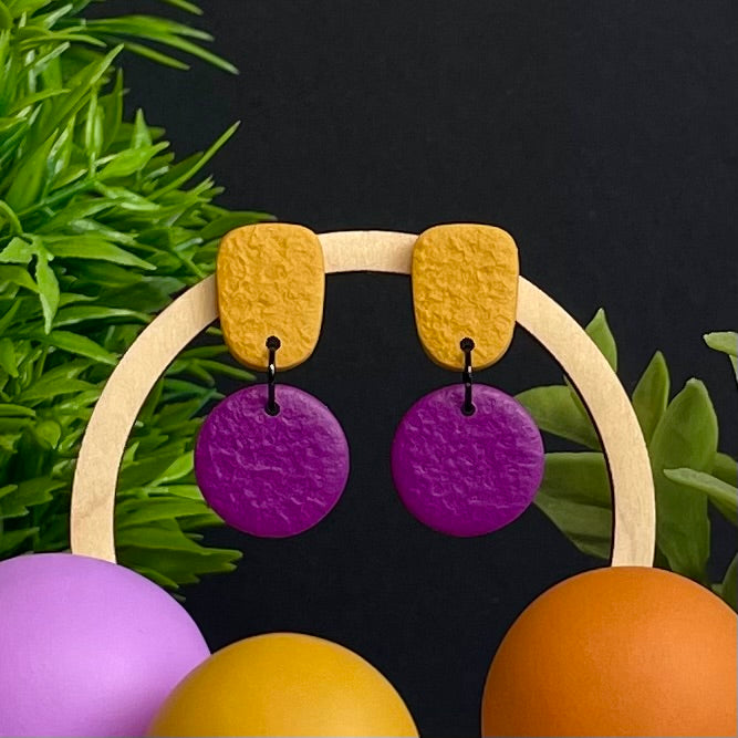 Mustard Yellow & Purple colour pop dangle earrings on hoop display prop