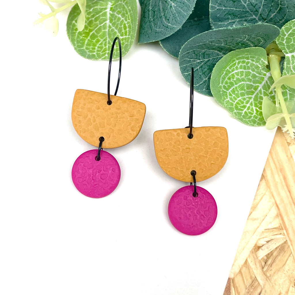 Mustard yellow & hot pink hoop earrings with black hoops 
