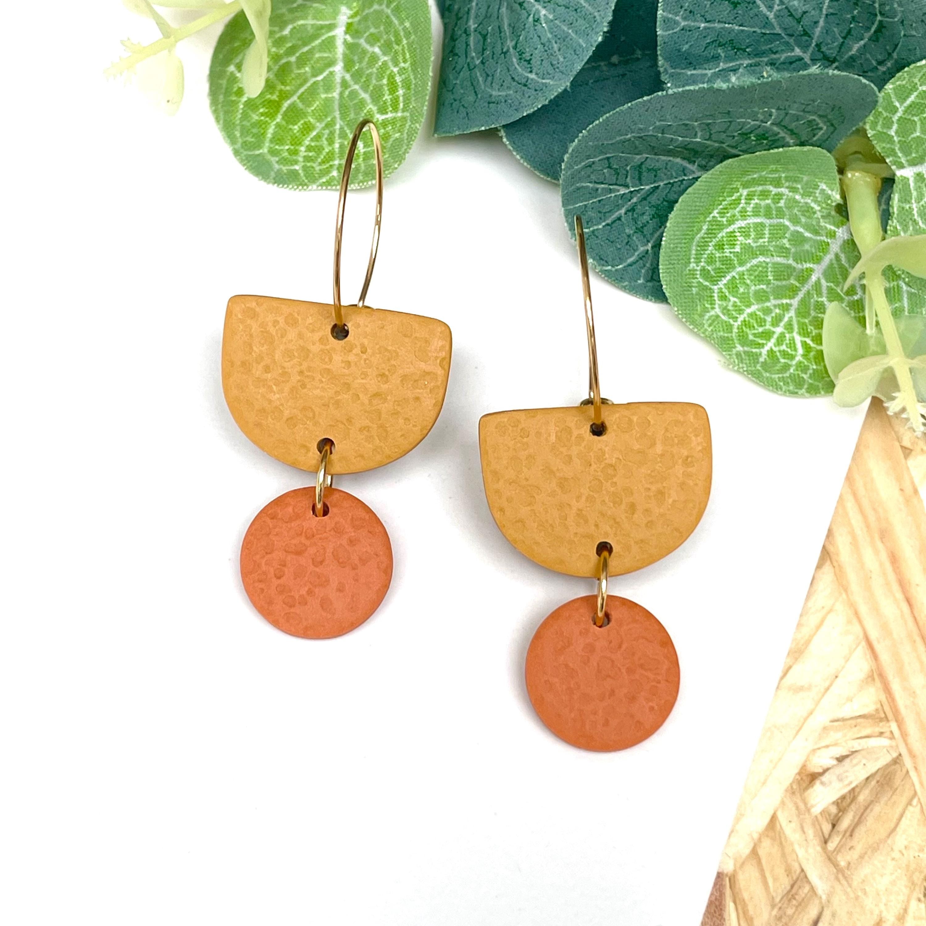 Mustard yellow & orange hoop earrings with gold hoops 