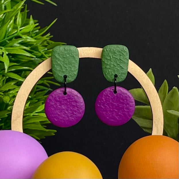 Olive Green & Purple colour pop dangle earrings on hoop display prop