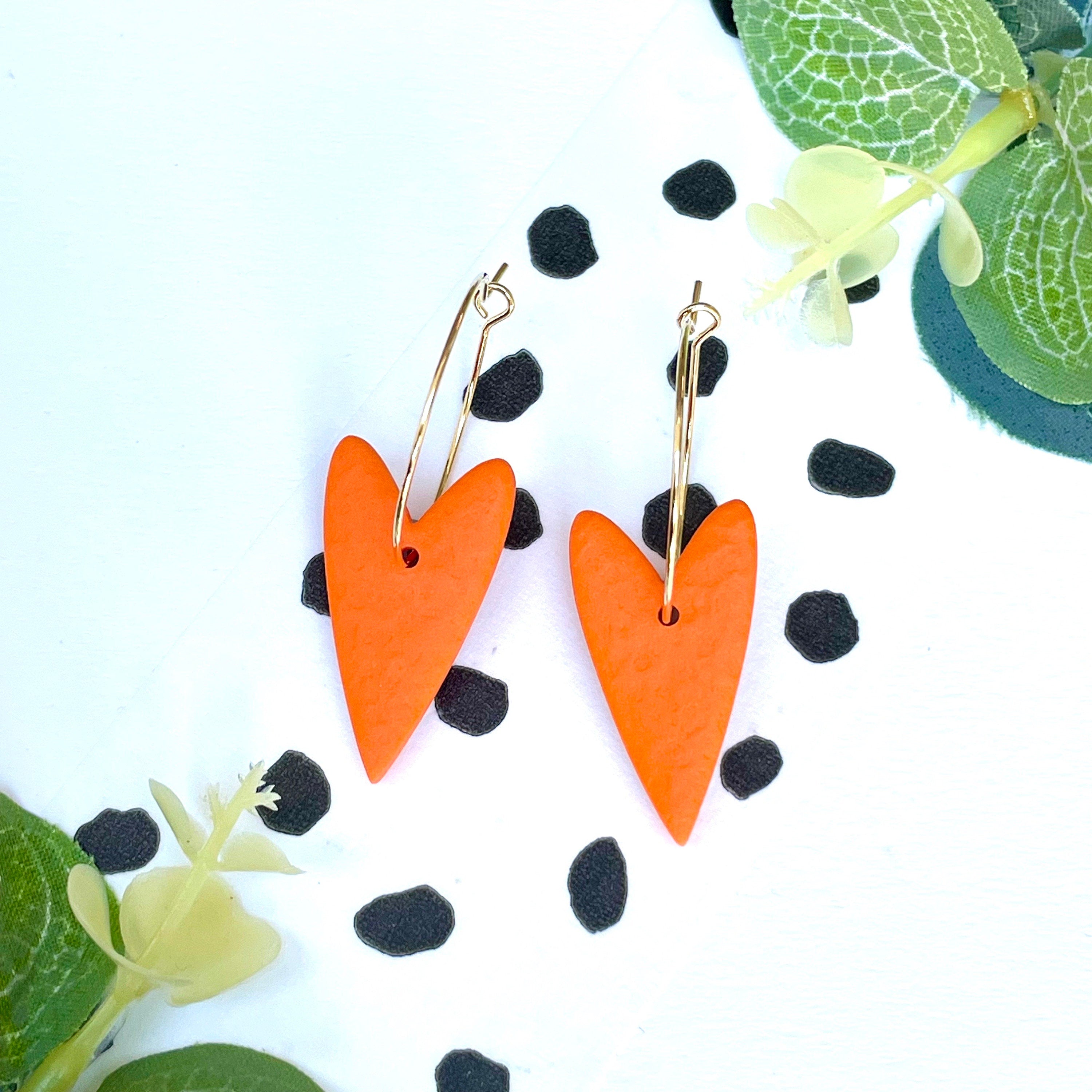 Orange hearts on gold colour hoops