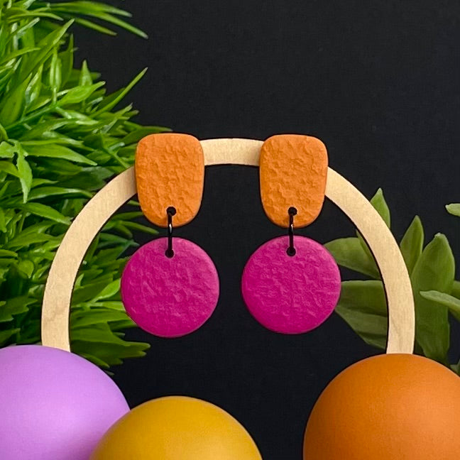Orange & Hot Pink colour pop dangle earrings on hoop display prop