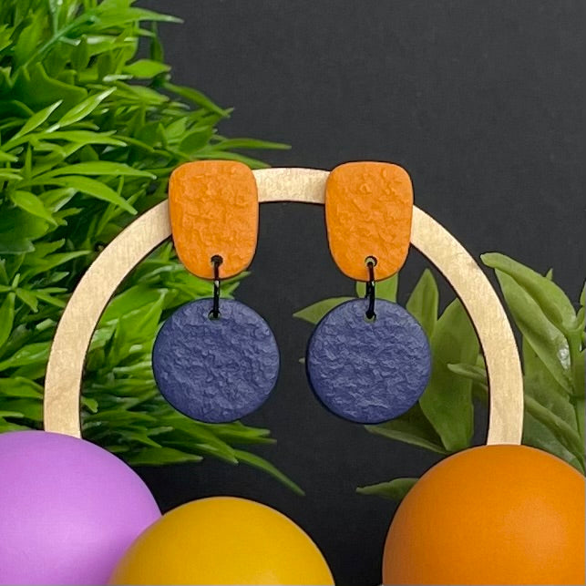 Orange & Navy Blue colour pop dangle earrings on hoop display prop