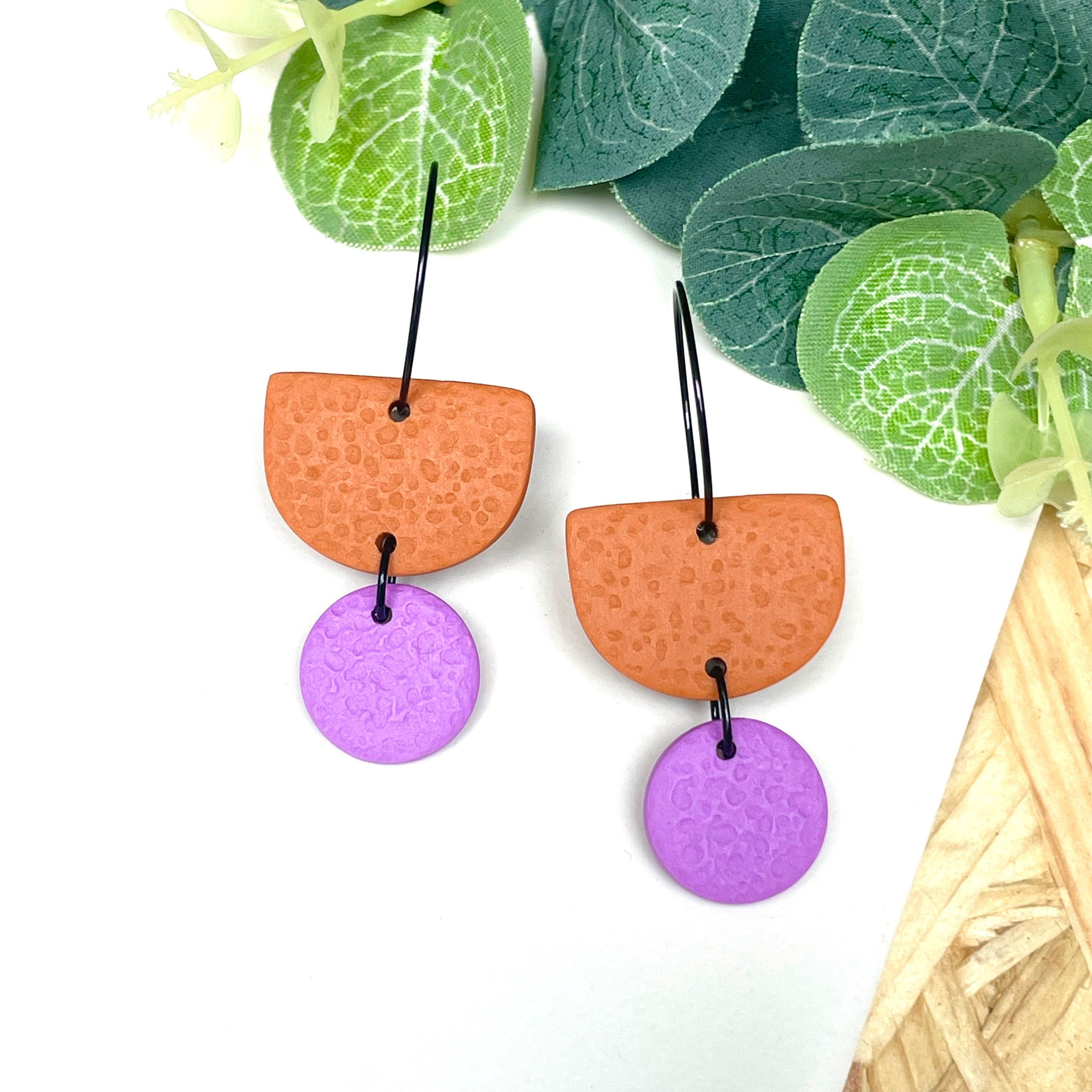 Orange & lilac hoop earrings with black hoops 