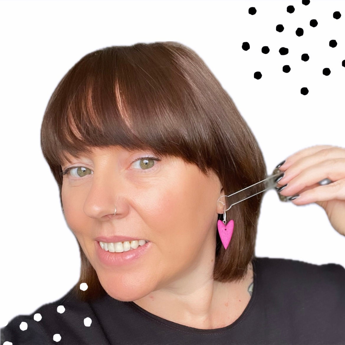 A try on pic of me wearing the earrings to show size and scale 