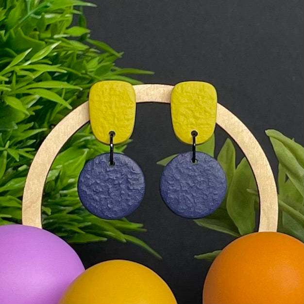 Pistachio Green & Navy Blue colour pop dangle earrings on hoop display prop