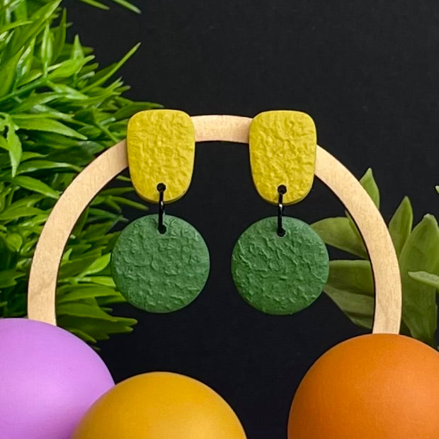 Pistachio & Olive Green colour pop dangle earrings on hoop display prop