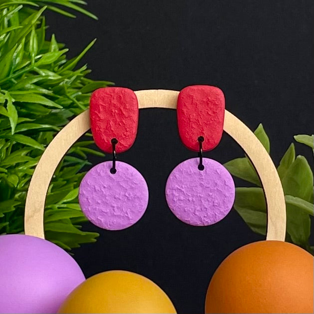 Red & Lilac colour pop dangle earrings on hoop display prop
