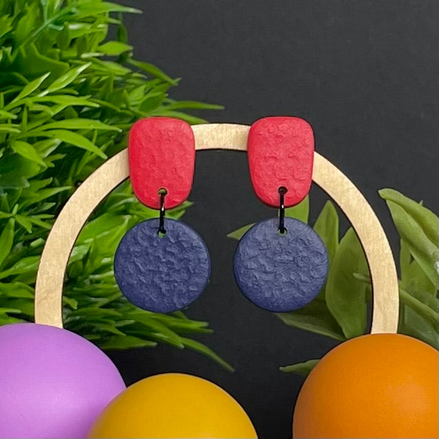 Red & Navy Blue colour pop dangle earrings on hoop display prop
