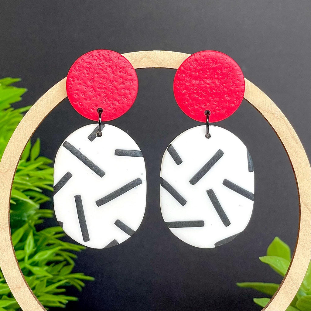 Earrings with red top and monochrome sprinkle oval dangles