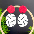 Earrings with red top and monochrome sprinkle oval dangles