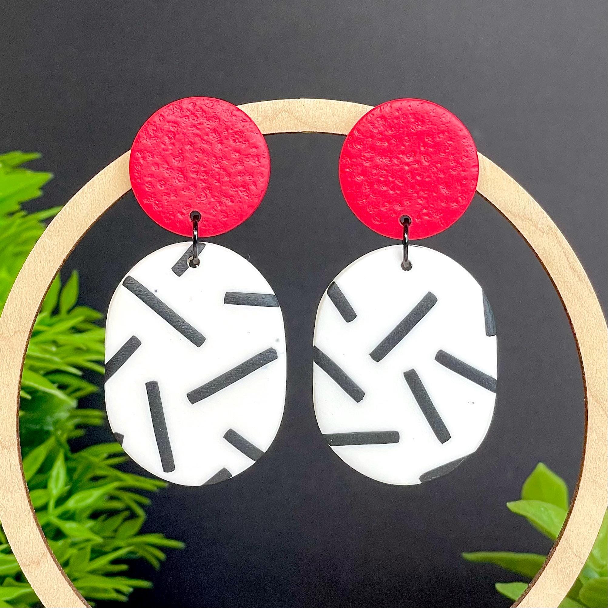 Earrings with red top and monochrome sprinkle oval dangles