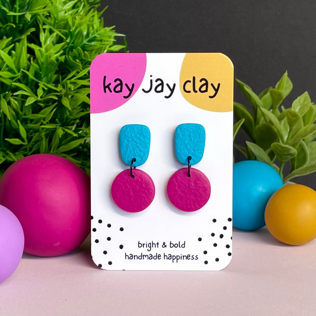 Turquoise & Hot Pink colour pop dangle earrings on Kay Jay Clay branded mounting card
