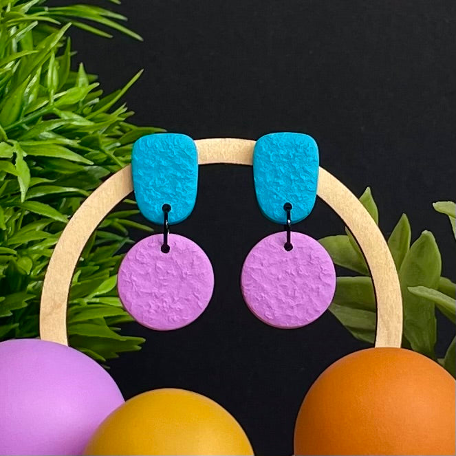 Turquoise & Lilac colour pop dangle earrings on hoop display prop