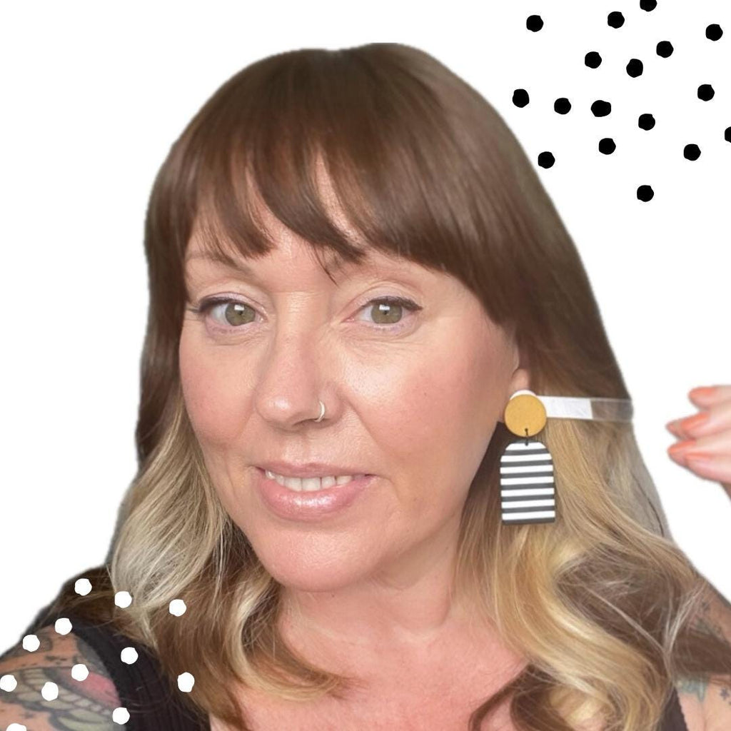Try on pic with striped earrings demonstrating how they will look being worn 